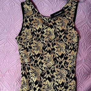 New with tag size small Candalite long dress. Black & gold.
